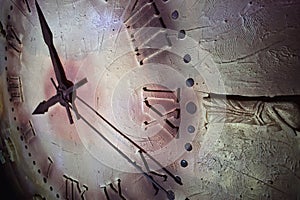 Close up of an antique clock and the time is almost midnight. Concept of time,the past or deadline