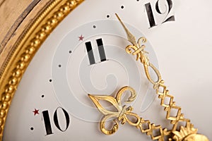 Close-up of antique gold clock