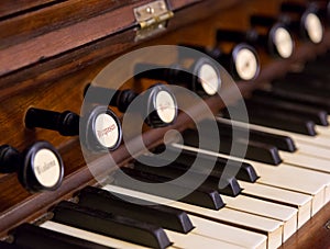 Close-up of antique reed organ harmonium photo