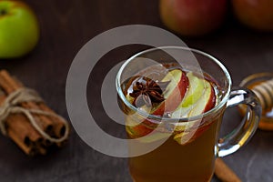 Apple cider with fresh apples and honey. Hot fruit tea with spices