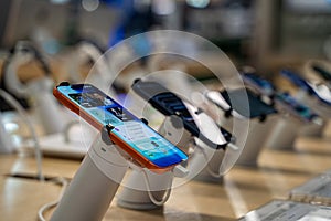 Close up of Apple iPhone 17 Pro Max and iPhone 17 Pro smartphones in technology store.