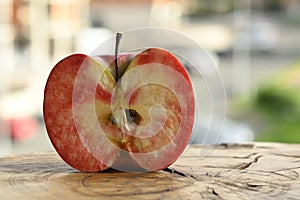 Close up of apple type with red, white, yellow and pink pulp