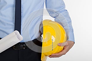 Close up of architect holding helmet