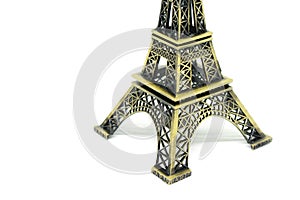 Close up architecture part of eiffel tower model isolated on white background.