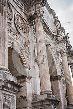 Close-up of Arco di Constantino near the Colosseum in Rome photo