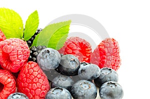 Studio shot mixed berries isolated on white