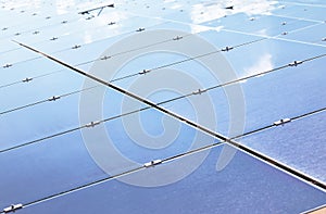 Close up array of thin film solar cells or amorphous silicon solar cells or photovoltaics in solar power plant