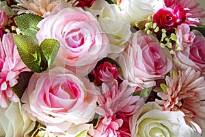 Close up of artificial flowers bouquet arrange for decoration in home photo