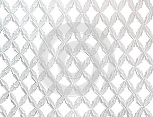 Artificial white crown flower mesh in seamless embroidery patterns isolated on background