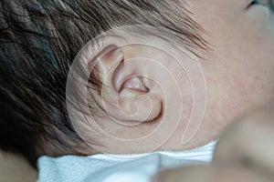Close up of Asia Chinese newborn baby ear