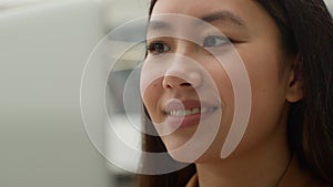 Close up Asia woman smiling face girl chinese korean businesswoman manager working on laptop computer at office Asian