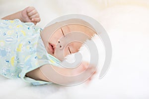 Close-up of asian baby boy sleeping .