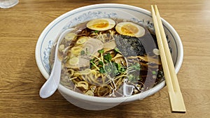 Close up of asian food. Noodle ramen soup mixed with pork ,egg ,