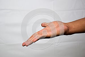 Close up Asian man shows hand gestures it means Look at that! isolated on white background