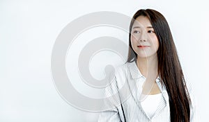 Close up of Asian woman portrait with long hair looking straight ahead