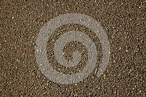 Close-up of asphalt with gravel inserted in it