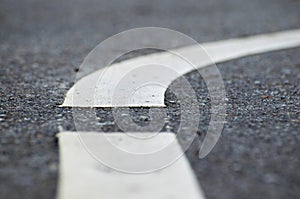 Close up asphalt road with bend to the right. Intersection on a street. Dutch roads. Urban scene transport network.