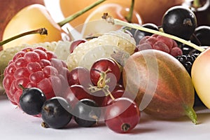 Close up of assorted summer berries and apricots