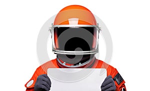 Close-up of an astronaut wearing orange spacesuit and helmet holding a blank sign, isolated on white background. Sci fi themes.