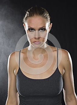 Close up Athletic Woman Looking Fierce at Camera