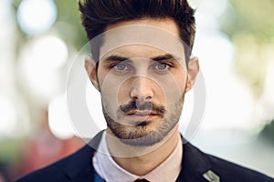 Close-up of attractive man in the street in formalwear. photo