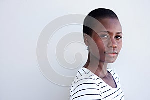 Close up attractive young black woman with serious expression photo