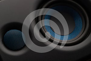 Close Up Audio Speaker or Woofer Cone with Blue Mesh Detail