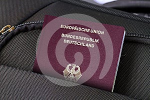 Close up of Austria Passport in Black Suitcase Pocket
