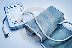 Close-up of an automatic blood pressure monitor for measuring blood pressure. The concept of hypertension and hypotension photo