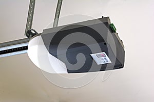 Close-up of an automatic garage door opener motor.