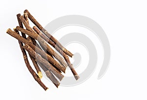 Close up of Ayurvedic herb Liquorice root,Licorice root, Mulethi or Glycyrrhiza glabra root on a wooden surface is very much