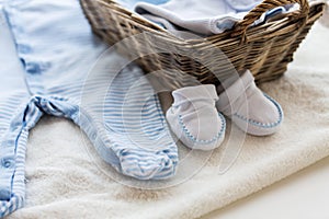 Close up of baby clothes for newborn boy in basket