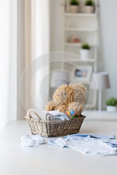 Close up of baby clothes and toys for newborn