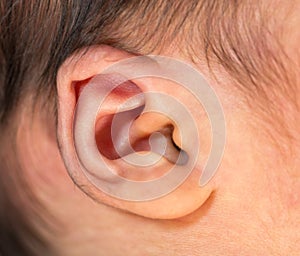 Close up baby newborn ear