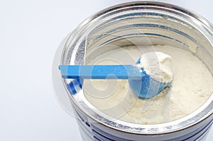 Powdered milk with spoon for baby photo