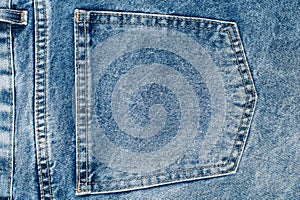 Close up on a back pocket of a blue jeans