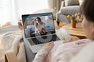 Pregnant woman talk on video online call on laptop
