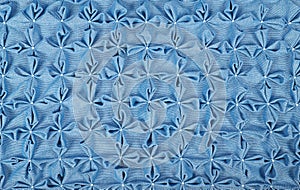 Close up background of blue textile puffs