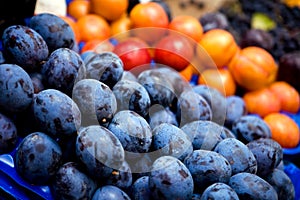 Close up background of dark blue plums