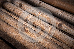 Close up background of dry thick bamboo poles