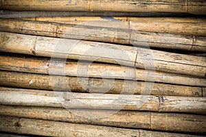 Close up background of dry thick bamboo poles