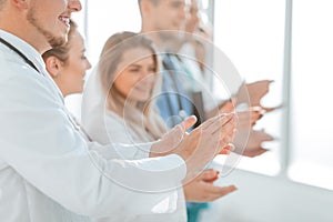 close up. background image of an applauding group of medical professionals