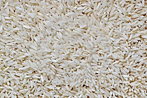 Raw long grain rice macro view.