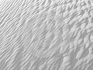 Close up of background texture of desert sand dunes. Beautiful structures of sandy dunes on sunny summer day. Annual growth of are