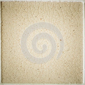 Background and texture of stretch marks cracked on white cream glazed tile