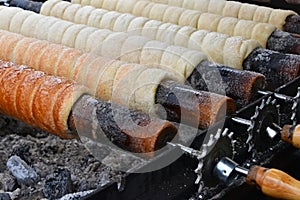 Close up baking chimney cake on grill