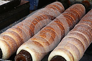 Close up baking chimney cake on grill