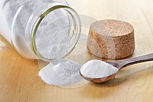 Close-up of baking soda in a glass jar.