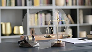 Close Up of Balance Scale and Gravel on Court Room Table