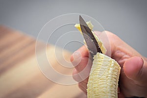 Close up of banana slices cut with the knife
